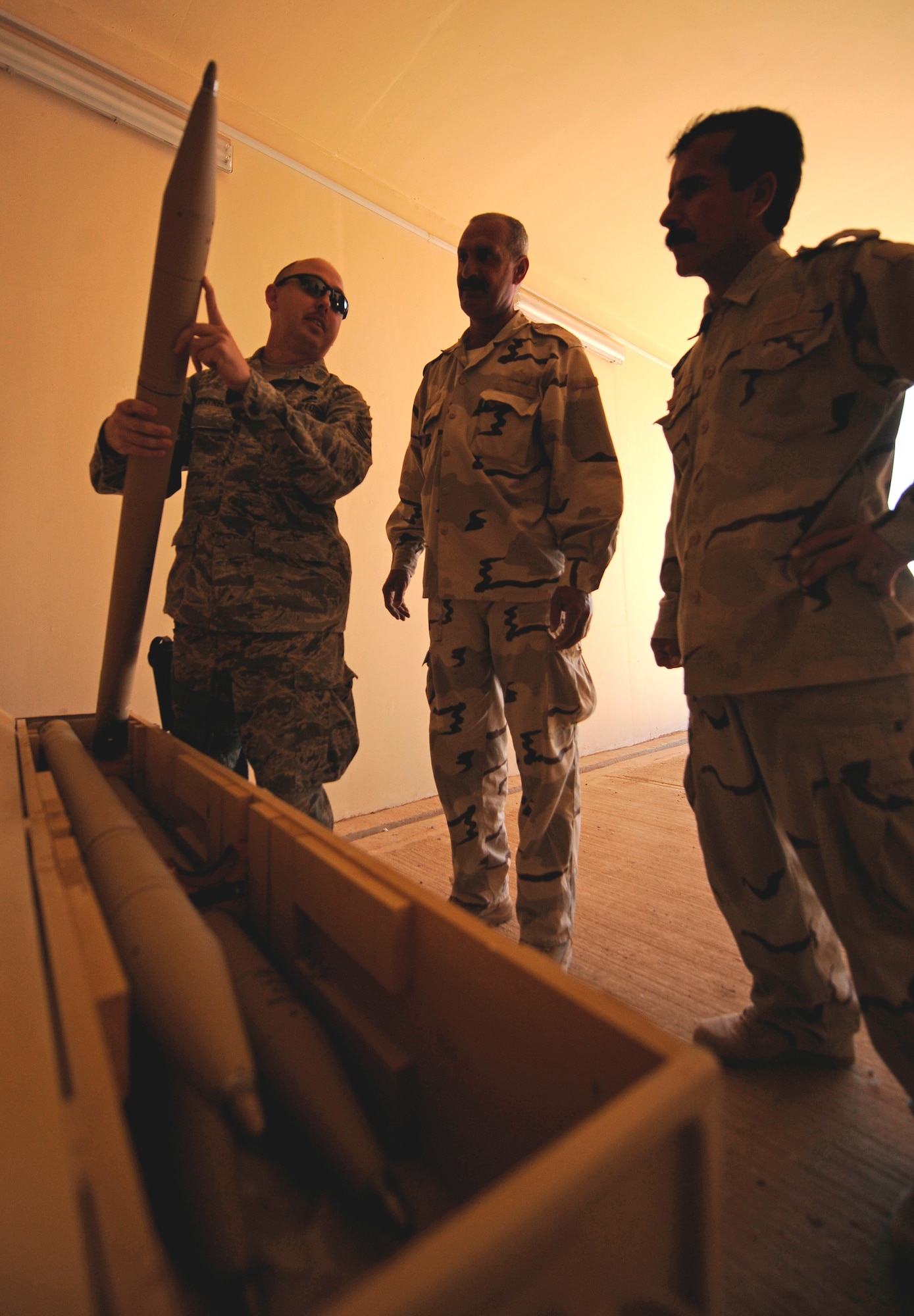 CAMP TAJI, Iraq -- U.S. Air Force Tech. Sgt. Kevin Cantrell, 721st Air Expeditionary Advisory Squadron ammo and logistics advisor to the Iraqi Army Aviation Command, provides weapons safety training to his Iraqi partners March 1. The NCO deployed from Langley Air Force Base, Va., was recently recognized as Air Combat Command's 2010 Logistics Safety Outstanding Achievement award winner for his efforts with the F-22 Raptor at homestation and his contributions to Iraqi Army Aviation Command. Sergeant Cantrell is a native of Mobile, Ala. (USAF photo by Tech. Sgt. Jason Lake)