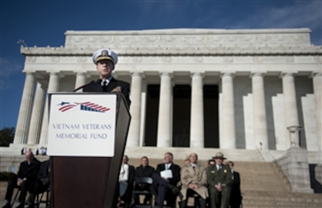 Chairman of the Joint Chiefs of Staff Adm. Mike Mullen, U.S. Navy, introduces Australian Prime Minister Julia Gillard at a ceremony on the steps of the Lincoln Memorial in Washington, D.C., on March 7, 2011.  The ceremony announced the donation of $3.3 million by the Australian government to help fund the "Education Center at the Wall" that would be located near the Vietnam Veterans' Memorial.  