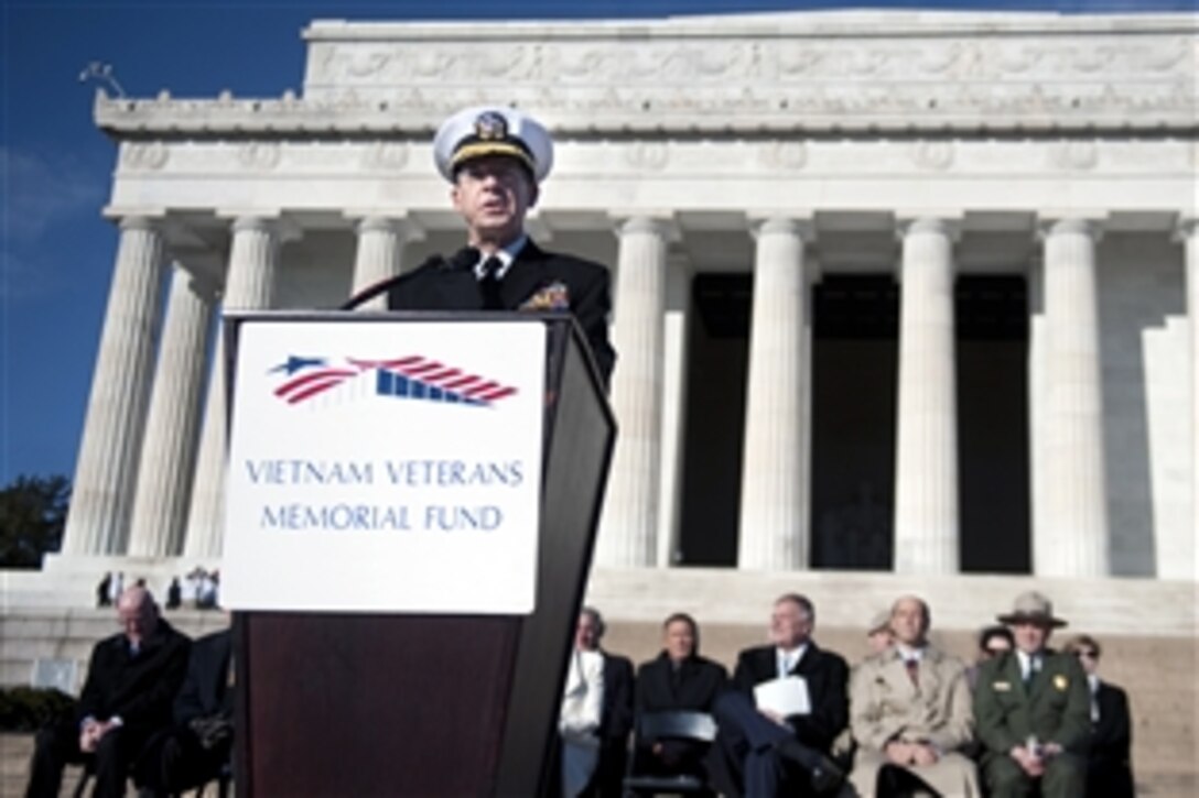 U.S. Navy Adm. Mike Mullen, chairman of the Joint Chiefs of Staff, introduces Australian Prime Minister Julia Gillard at a ceremony on the steps of the Lincoln Memorial in Washington, D.C., 
March 7, 2011. The ceremony announced  the donation of $3 million by the Australian government to help fund the "Education Center at the Wall," which would display items placed at the memorial. 