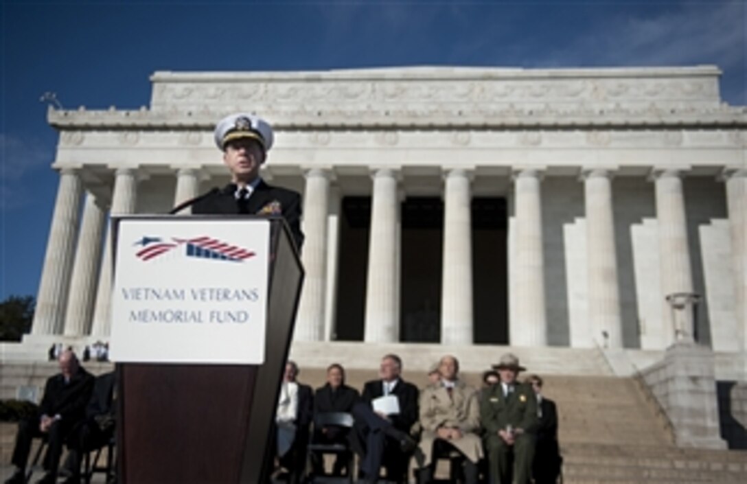 Chairman of the Joint Chiefs of Staff Adm. Mike Mullen, U.S. Navy, introduces Australian Prime Minister Julia Gillard at a ceremony on the steps of the Lincoln Memorial in Washington, D.C., on March 7, 2011.  The ceremony announced the donation of $3.3 million by the Australian government to help fund the "Education Center at the Wall" that would be located near the Vietnam Veterans' Memorial.  