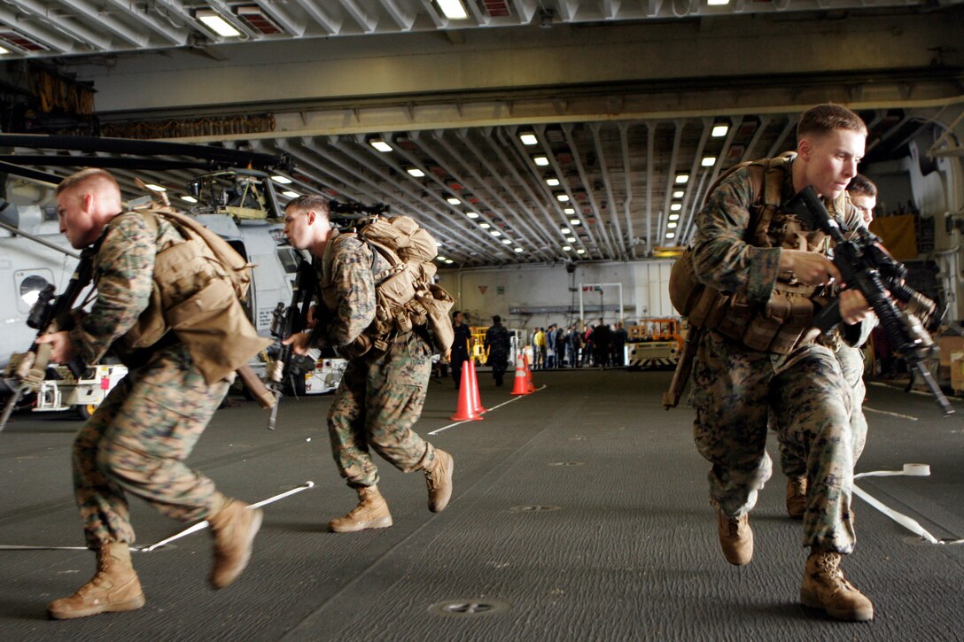 Marines of Weapons Company, Battalion Landing Team 2nd Battalion, 5th Marines, 31st Marine Expeditionary Unit, practice room and hallway clearing techniques, March 8. The training ensures the Marines of the 31st MEU remain ready to respond to any situation that may arise.