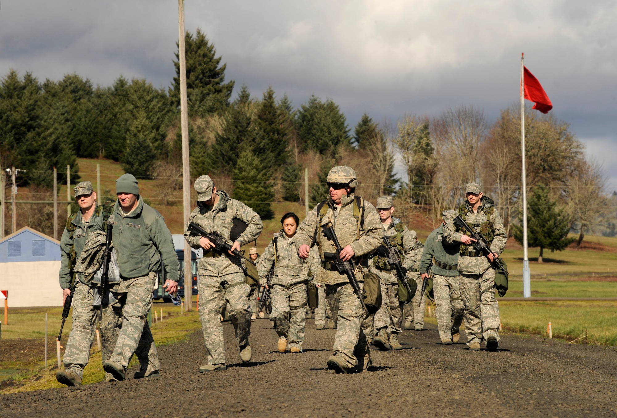 Airmen of the Oregon Air National Guard's 116th Air Control Squadron arrive at Camp Adair, Ore., for weapons training on February 17, 2011. Over 80 members of the 116th ACS will depart in March of 2011 to the Middle East to support Operation Enduring Freedom. (U.S. Air Force photograph by Tech. Sgt. John Hughel, 142nd Fighter Wing Public Affairs)