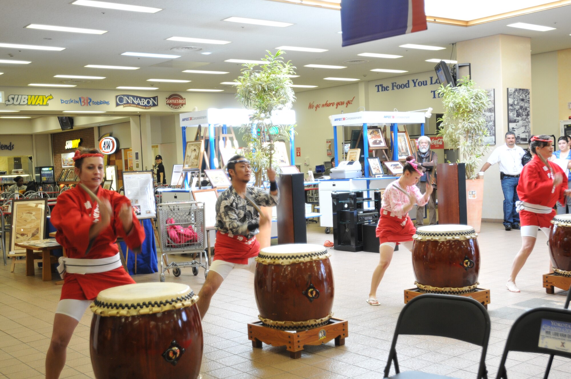 YOKOTA AIR BASE, Japan -- Taiko drummers perform at the grand re-opening of the Yokota Exchange here March 4. Renovations on the facility took six months and several events were held during the grand re-opening celebration. (U.S. Air Force photo/Airman 1st Class Krystal M. Garrett)