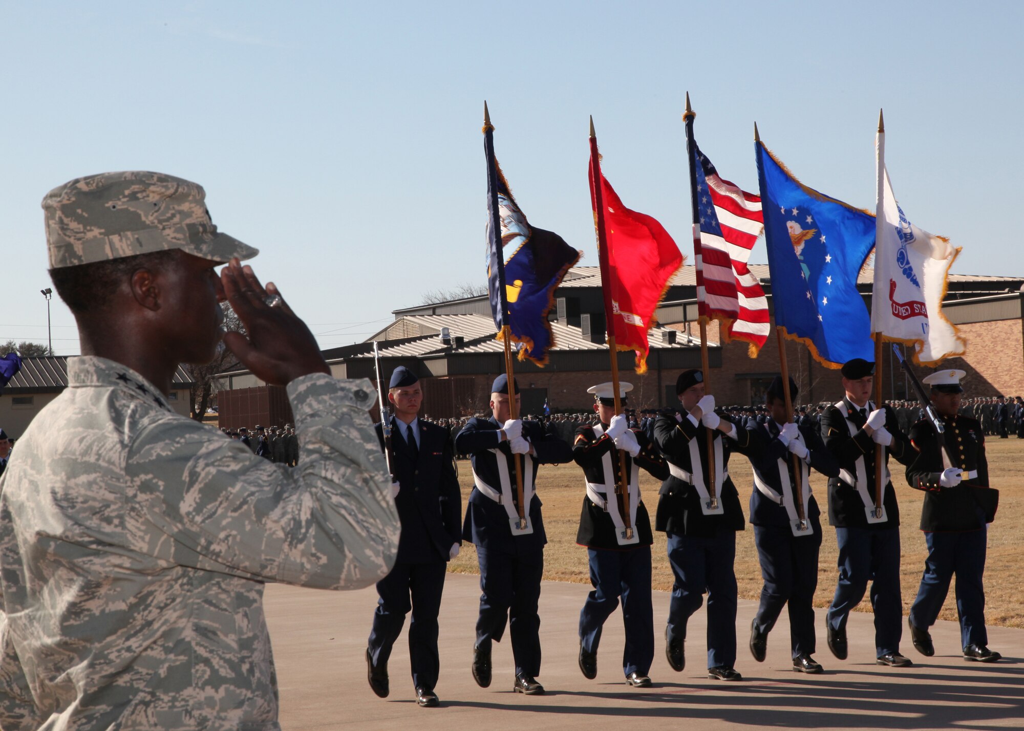 Gen. Edward Rice Jr., Air Education and Training Command commander, renders a salute March 2 during a pass and review parade at Sheppard Air Force Base, Texas. The general hosted the spring AETC leadership conference at the North Texas base to discuss various topics that related to the command. (U.S. Air Force photo/Airman 1st Class Adawn Kelsey)