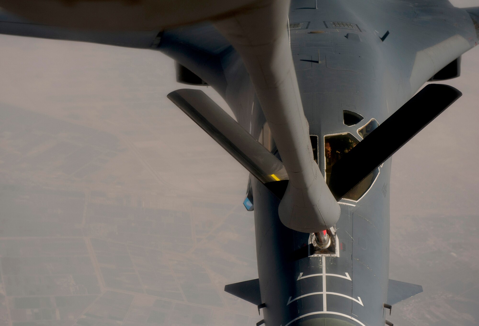 A B-1B Lancer is refueled by a KC-135 Stratotanker Feb 26, 2011, above Iraq, in support of Operation New Dawn. (U.S. Air Force photo/Master Sgt. Adrian Cadiz)