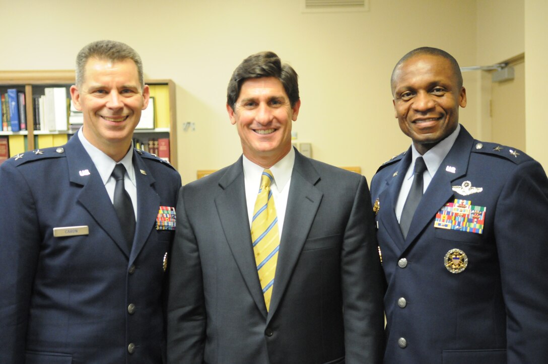 Maj. Gen. Gerard Caron, 79th Medical Wing commander, and Maj. Gen. Darren McDew, Air Force District of Washington commander, attend a reception hosted by Southern Maryland Hospital CEO Michael Chiaramonte during a tour of the hospital March 2. Southern Maryland Hospital’s partnership with Joint Base Andrews has been beneficial in several ways, including offering deployed Airmen the opportunity to take part in their child’s birth via Skype. (U.S. Air Force photo/ Mike Martin)