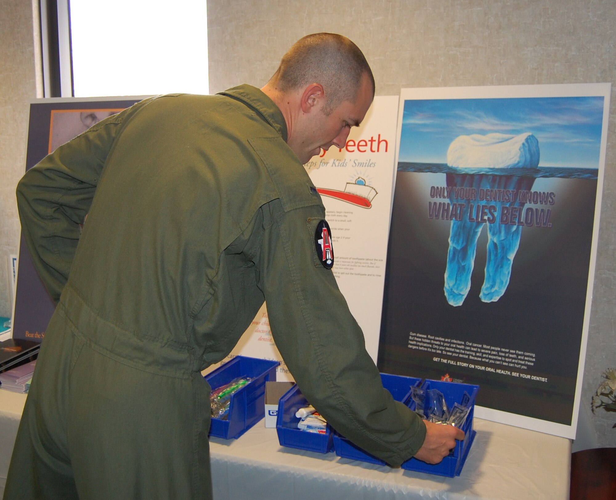 LAUGHLIN AIR FORCE BASE, Texas- 1st Lt. Wesley Szempruch, 85th Flying Training Squadron looks at mouth guards at the Dental Clinic’s health fair booth. The 47th Medical Group is putting on the health fair with the Health and Wellness Center Mar. 7-11. (U.S. Air Force photo by 2nd Lt. Patrick O’Neill)
