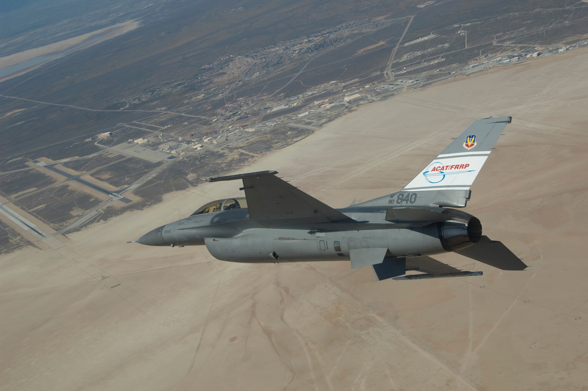 The Automatic Collision Avoidance Technology Fighter Risk Reduction Program F-16 flies over Edwards Air Force Base, Calif. during an Automatic Ground Collision Avoidance System (Auto GCAS) flight test.  This vehicle helped validate Auto GCAS, readying the technology for the planned integration into F-16 production aircraft in 2014.  (NASA photo)