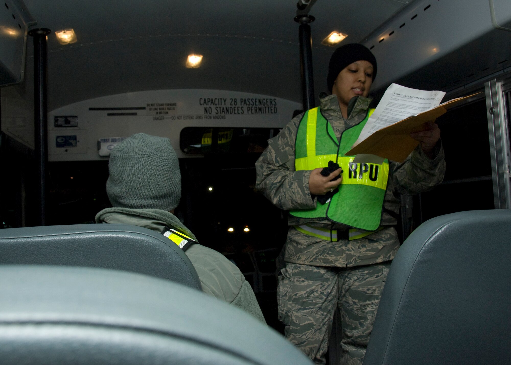 YOKOTA AIR BASE, Japan -- Senior Airman Shanesha Lee, 374th Force Support Squadron reception processing unit team member, performs an accountability check for members processing the deployment line during an Operational Readiness Exercise here March 8. The RPU team ensures incoming personnel are well-situated and accounted for. (U.S. Air Force photo/Airman 1st Class Andrea Salazar)