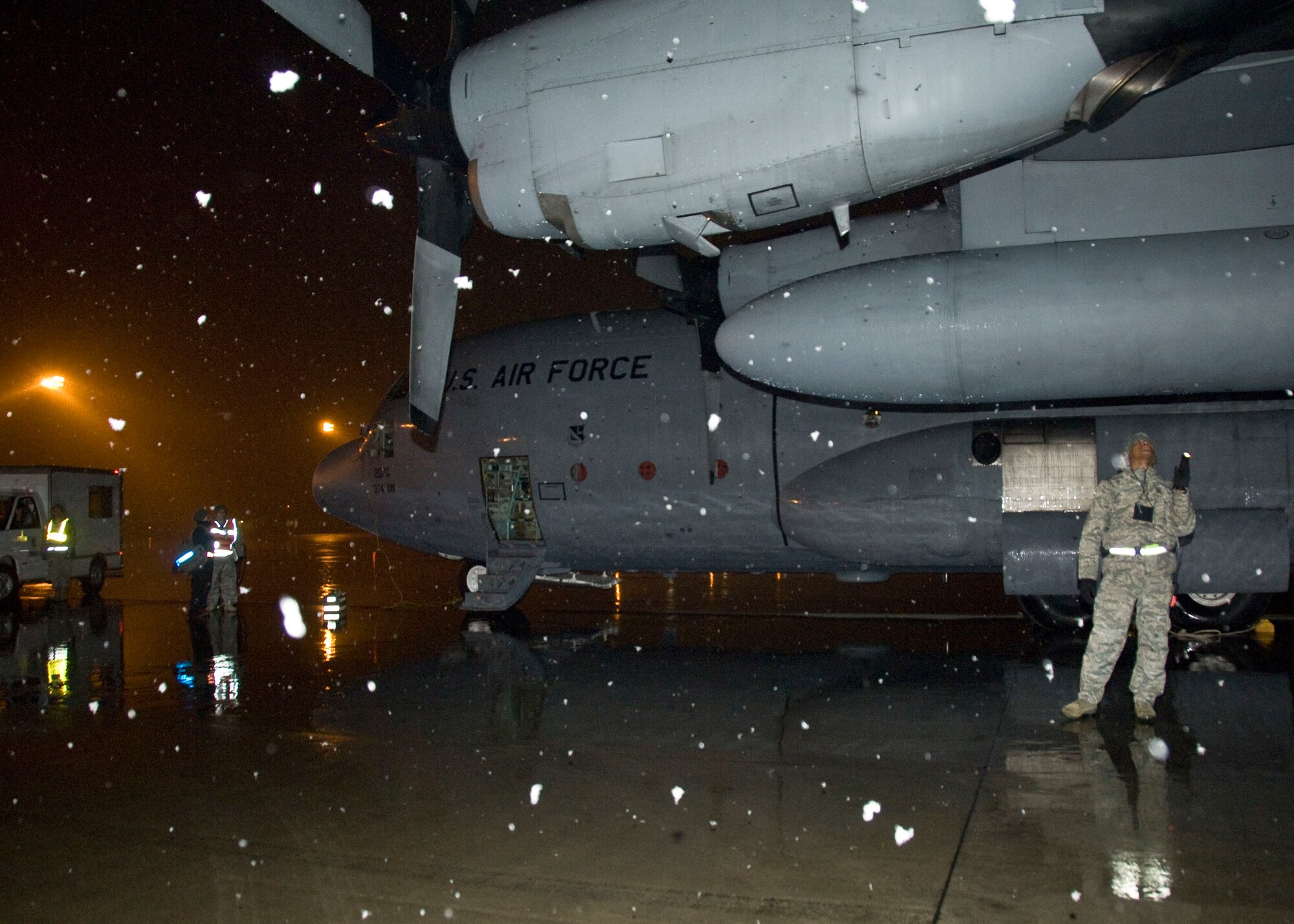 YOKOTA AIR BASE, Japan --  Tech. Sgt. Gregory Streeter, 374th Maintenance Operations Squadron quality assurance inspector, evaluates a C-130 Hercules during an Operational Readiness Exercise here March 7. Inspection evaluations are crucial to the wing's mission by ensuring aircraft are safe to operate. (U.S. Air Force photo/Airman 1st Class Andrea Salazar)