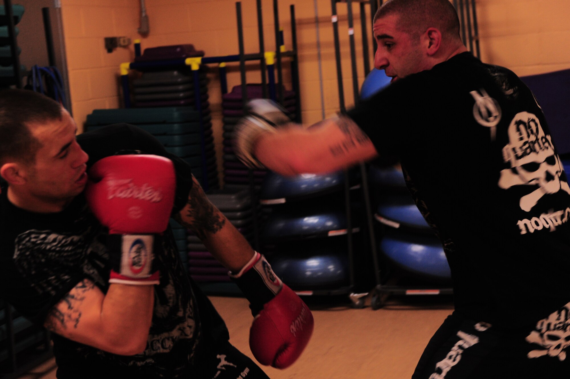 SHAW AIR FORCE BASE, S.C. -- Staff Sgt. Derrick Kennington, 20th Civil Engineer Squadron, and Staff Sgt. Ferdinando Acerra, 20th Maintenance Operations, spar at the fitness center here Feb. 20, 2011. Sergeants Kennington and Acerra are part of a mixed martial arts team that train and compete out of Columbia, S.C. (U.S. Air Force photo/Airman 1st Class Daniel Phelps(Released)