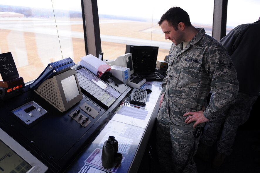 OFFUTT AIR FORCE BASE, Neb. - Airman 1st Class Mike Bier, an air traffic controller apprentice assigned to the 55th Operations Support Squadron, monitors aircraft traffic in and around Offutt, Feb. 24. U.S. Air Force Photo by Josh Plueger (Released)
