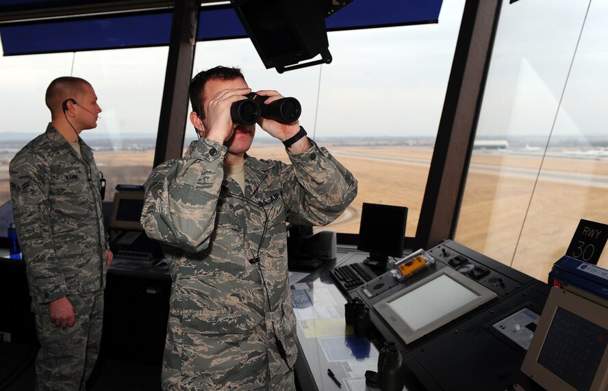 OFFUTT AIR FORCE BASE, Neb. - Airman 1st Class Mike Bier, an air traffic controller apprentice assigned to the 55th Operations Support Squadron, monitors east bound aircraft descending here, Feb. 24. U.S. Air Force Photo by Josh Plueger (Released)
