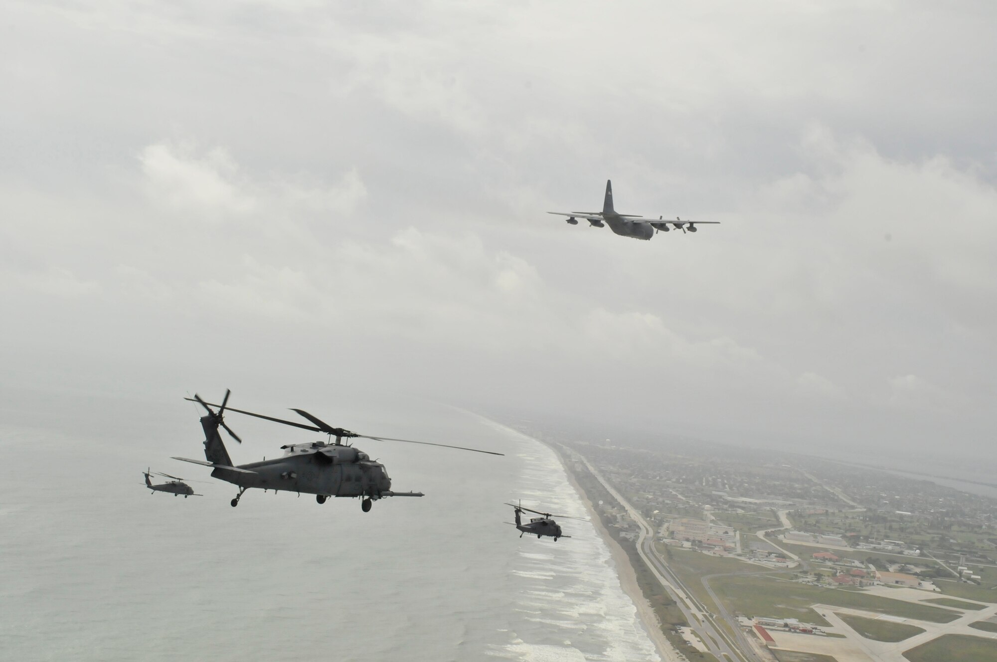 PATRICK AIR FORCE BASE, Fla. - Airmen from the Air Force Reserve's 920th Rescue Wing here flew the entire fleet of six HH-60G Pave Hawk helicopters and three HC-130P/N King aircraft for a mass evacuation exercise March 6, then flew out to sea where the kings refueled the pave hawks before returning to base. (U.S Air Force photo/Staff Sgt. Annamarie Wyant)