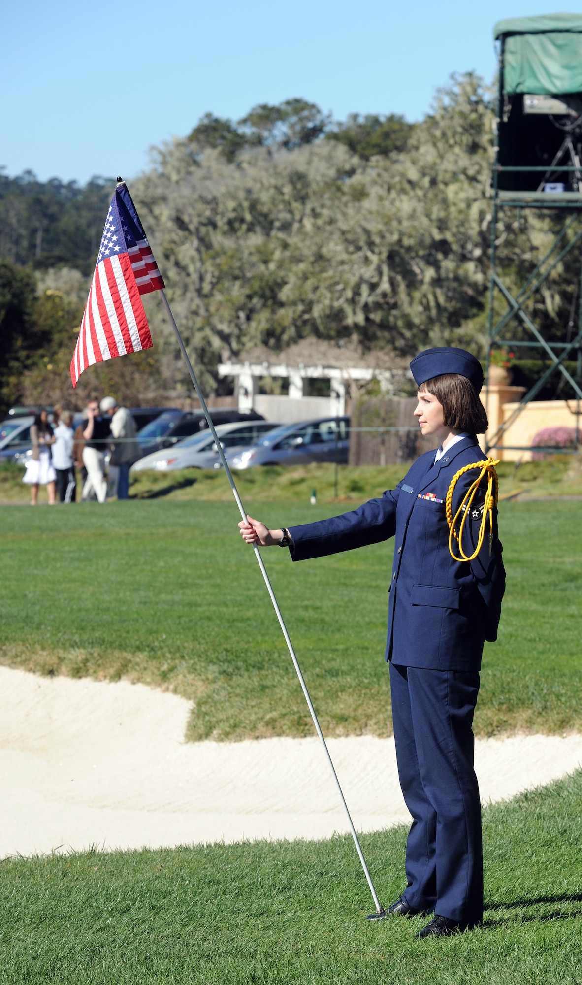 PEBBLE BEACH, Calif. - Airman 1st Class Risa Hess holds the pin of Pebble Beach's 15th hole while at parade rest during play of the AT&T Pebble Beach Pro-Am. (U.S. Air Force photo/Steven L. Shepard)