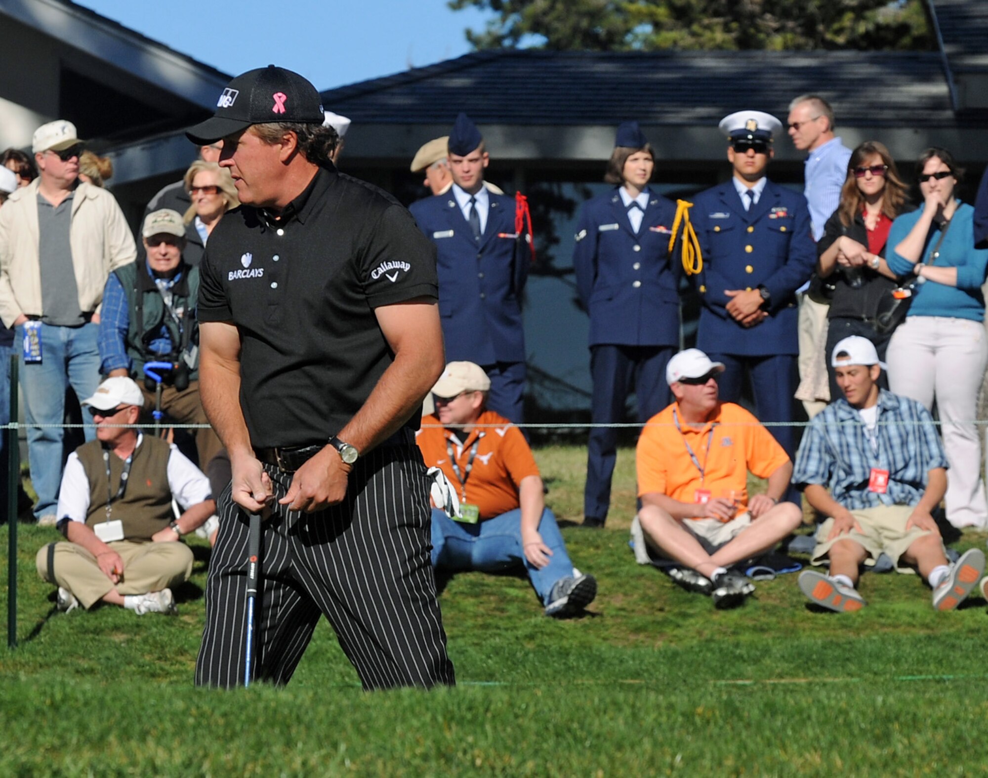 PEBBLE BEACH, Calif. - Prior to assuming their pin-tending duties during the AT&T Pebble Beach National Pro-Am, service members watch professional golfer Phil Mickelson birdie the third hole at Pebble Beach. (U.S. Air Force photo/Steven L. Shepard)