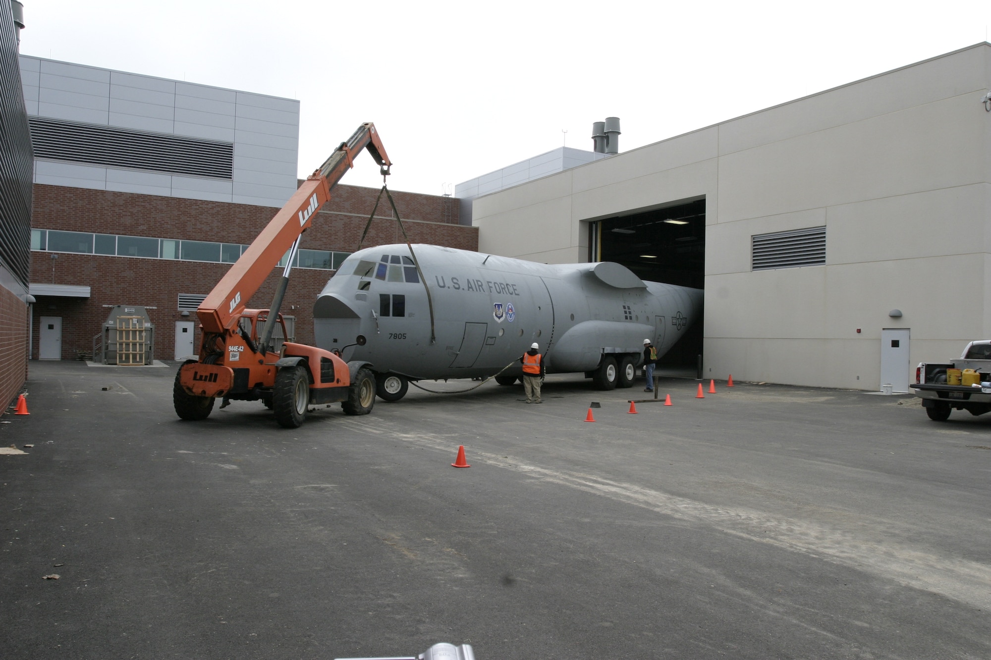 The C-130 Training Simulator is moved into its new home in 711th Human Performance Wing complex.