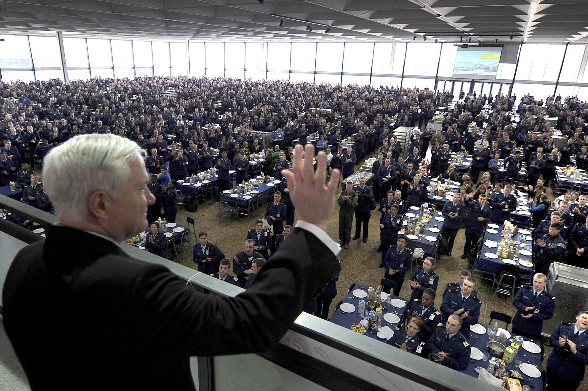 Defense Secretary Robert Gates gives a wave to Air Force Academy Cadets during lunch in Mitchell Hall after teaching classes as part of the Capstone Seminar at the Air Force Academy in Colorado Springs, Co., Mar. 4, 2011. DOD photo by Master Sgt. Jerry Morrison(RELEASED)