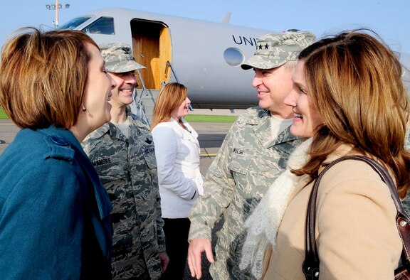 RAF MILDENHALL, England -- Col. Chad Manske, 100th Air Refueling Wing commander, and his wife Stacey welcome Gen. Mark A. Welsh III, U.S. Air Forces in Europe commander, and his wife Betty, to RAF Mildenhall after they landed here March 2, 2011. This was General Welsh's first visit to RAF Mildenhall after assuming command of USAFE. (U.S. Air Force photo/Senior Airman Ethan Morgan)