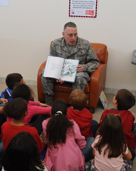 Col. Jay Cloutier, the 39th Medical Group commander, reads to children of an Incirlik Unit School 2nd grade class March 3, 2011, at Incirlik Air Base, Turkey, in support of the Reach Out and Read program.  Reach Out and Read is an evidence-based nonprofit organization that promotes early literacy and school readiness in pediatric exam rooms nationwide by giving new books to children and advice to parents about the importance of reading aloud.  (U.S. Air Force photo by Airman 1st Class Clayton Lenhardt/Released)