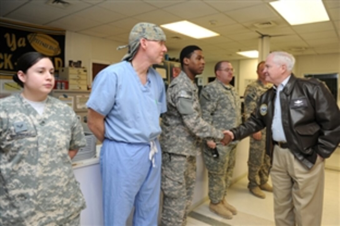 U.S. Defense Secretary Robert M. Gates meets with doctors and staff at Heathe N. Craig Joint Theater Hospital at Bagram Air Field, in Kabul, Afghanistan, March 7, 2011.  