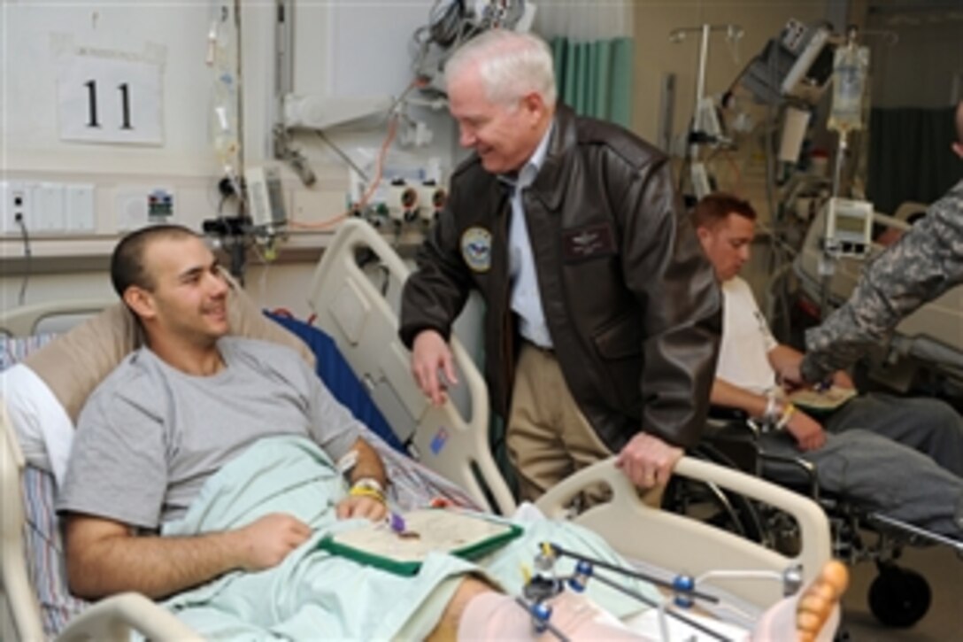 U.S. Defense Secretary Robert M. Gates speaks with wounded warriors in Kabul, Afghanistan, March 7, 2011. 