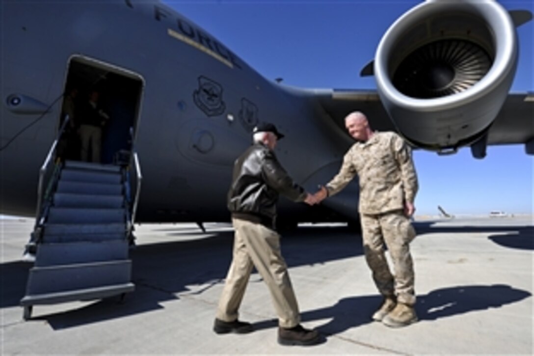 U.S. Marine Corps Maj. Gen. Richard Mills greets U.S. Defense Secretary Robert M. Gates as he arrives on Camp Leatherneck in Afghanistan, March 8, 2011. Mills is the commander of the 1st Marine Expeditionary Force and the International Security Assistance Force Regional Command Southwest.

