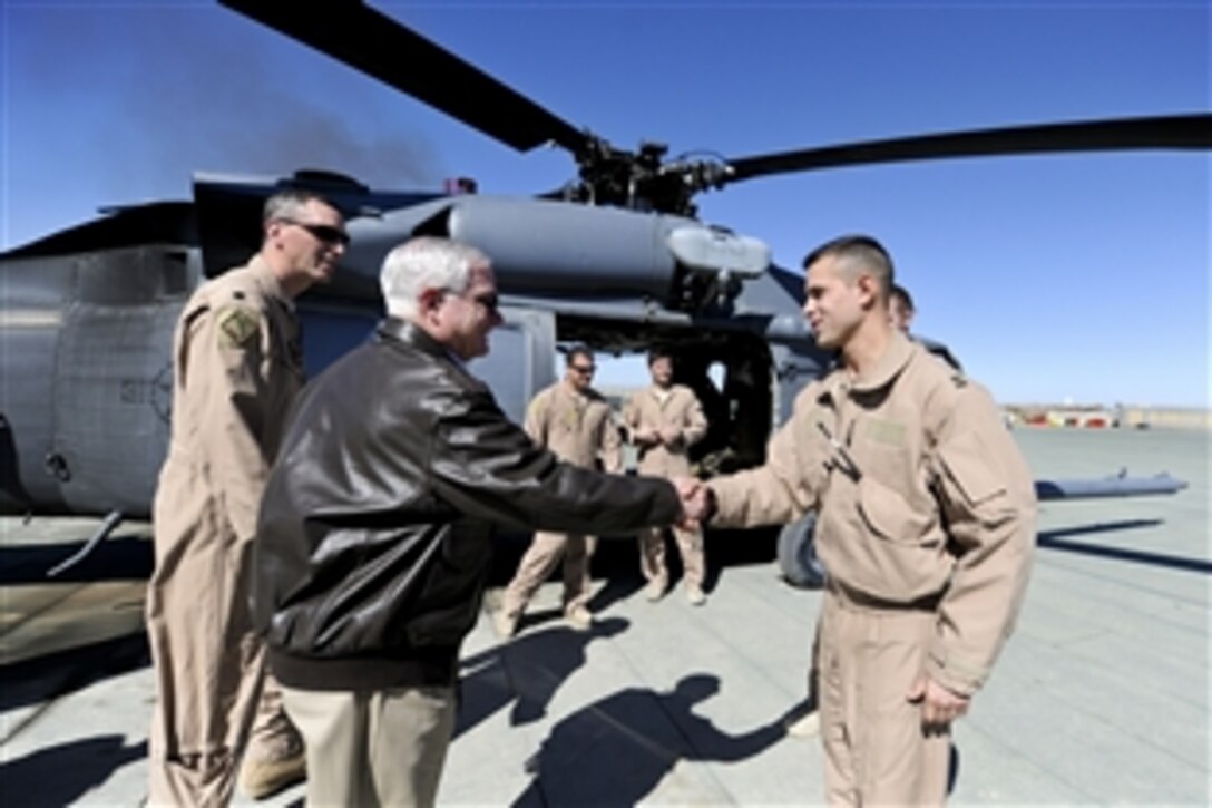 U.S. Defense Secretary Robert M. Gates shakes hands with members of the Pedro medevac unit on Camp Leatherneck in Afghanistan, March 8, 2011.