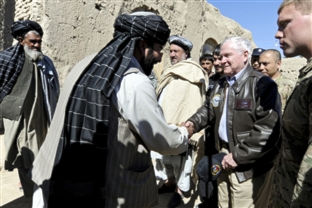 U.S. Defense Secretary Robert M. Gates meets with elders in the village of Tabin outside Combat Outpost Kowall in Afghanistan, March 8, 2011.
