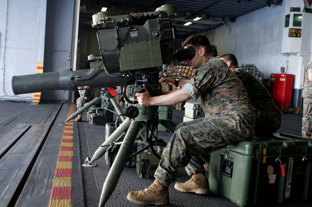 Marines with Weapons Company, Battalion Landing Team 2d Battalion, 5th Marines, 31st Marine Expeditionary Unit, adjust the sights on an M41 A4 Saber system during training March 9. The 31st MEU is the nation's only continually forward-deployed MEU, and is constantly training to ensure it remains ready to respond at all times.