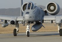 An A-10C aircraft from Davis-Monthan Air Force Base, Arizona, arrives March 9 to Osan Air Base, Republic of Korea. The U.S. Air Force is deploying 12 A-10C aircraft from Davis-Monthan to Osan for approximately six months as part of a scheduled deployment. The unit, called the 354th Expeditionary Fighter Squadron, will replace the 100th Expeditionary Fighter Squadron at Kunsan that is returning to the 187th Fighter Wing, Alabama. (U.S. Air Force photo/Senior Master Sgt. Paul Holcomb)