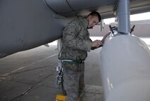 Airman 1st Class Alexander Dean, a crew chief assigned to the 354th Expeditionary Fighter Squadron, receives the first A-10C aircraft from Davis-Monthan Air Force Base, Arizona, to land at Osan Air Base, Republic of Korea, March 9.  The U.S. Air Force is deploying 12 A-10C aircraft from Davis-Monthan to Osan for approximately six months as part of a scheduled deployment. (U.S. Air Force photo/Senior Master Sgt. Paul Holcomb)