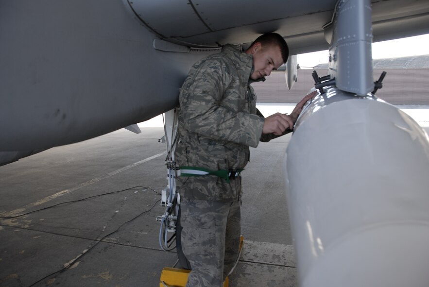 Airman 1st Class Alexander Dean, a crew chief assigned to the 354th Expeditionary Fighter Squadron, receives the first A-10C aircraft from Davis-Monthan Air Force Base, Arizona, to land at Osan Air Base, Republic of Korea, March 9.  The U.S. Air Force is deploying 12 A-10C aircraft from Davis-Monthan to Osan for approximately six months as part of a scheduled deployment. (U.S. Air Force photo/Senior Master Sgt. Paul Holcomb)