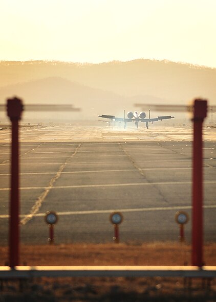 An A-10C aircraft touches down March 9 at Osan Air Base, Republic of Korea. The U.S. Air Force is deploying 12 A-10C aircraft from Davis-Monthan to Osan for approximately six months as part of a scheduled deployment. The unit, called the 354th Expeditionary Fighter Squadron, will replace the 100th Expeditionary Fighter Squadron at Kunsan that is returning to the 187th Fighter Wing, Alabama. (U.S. Air Force photo/Staff Sgt. Daylena Gonzalez)