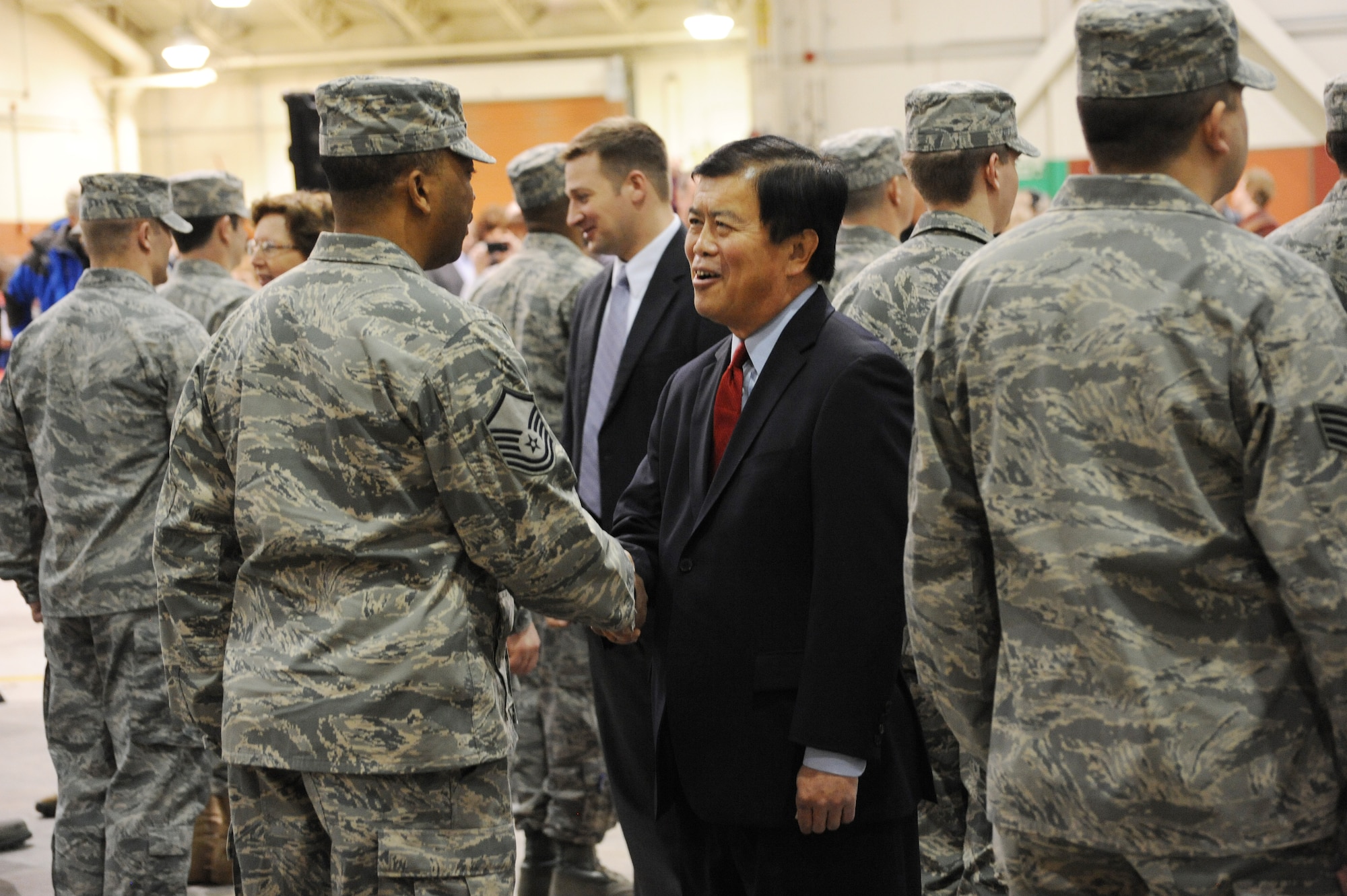 Oregon Congressman David Wu, meets with more than 80 Airmen of the Oregon Air National Guard's 116th Air Control Squadron, following the unit's mobilization ceremony at the Portland Air Guard Base in Portland, Ore., Mar. 4.  Kitzhaber, Maj. Gen. Raymond F. Rees, Adjutant General, Oregon; Brig. Gen. Steven Gregg, Oregon Air National Guard Commander; and other dignitaries, along with hundreds of family, friends, fellow Airmen and Soldiers attended the event.  The unit's Airmen will deploy to the Middle East in support of Air Forces Central (CENTAF), where they will perform Air Battle Management missions for four months.  (U.S. Air Force photograph by Tech. Sgt. John Hughel, 142nd Fighter Wing Public Affairs)