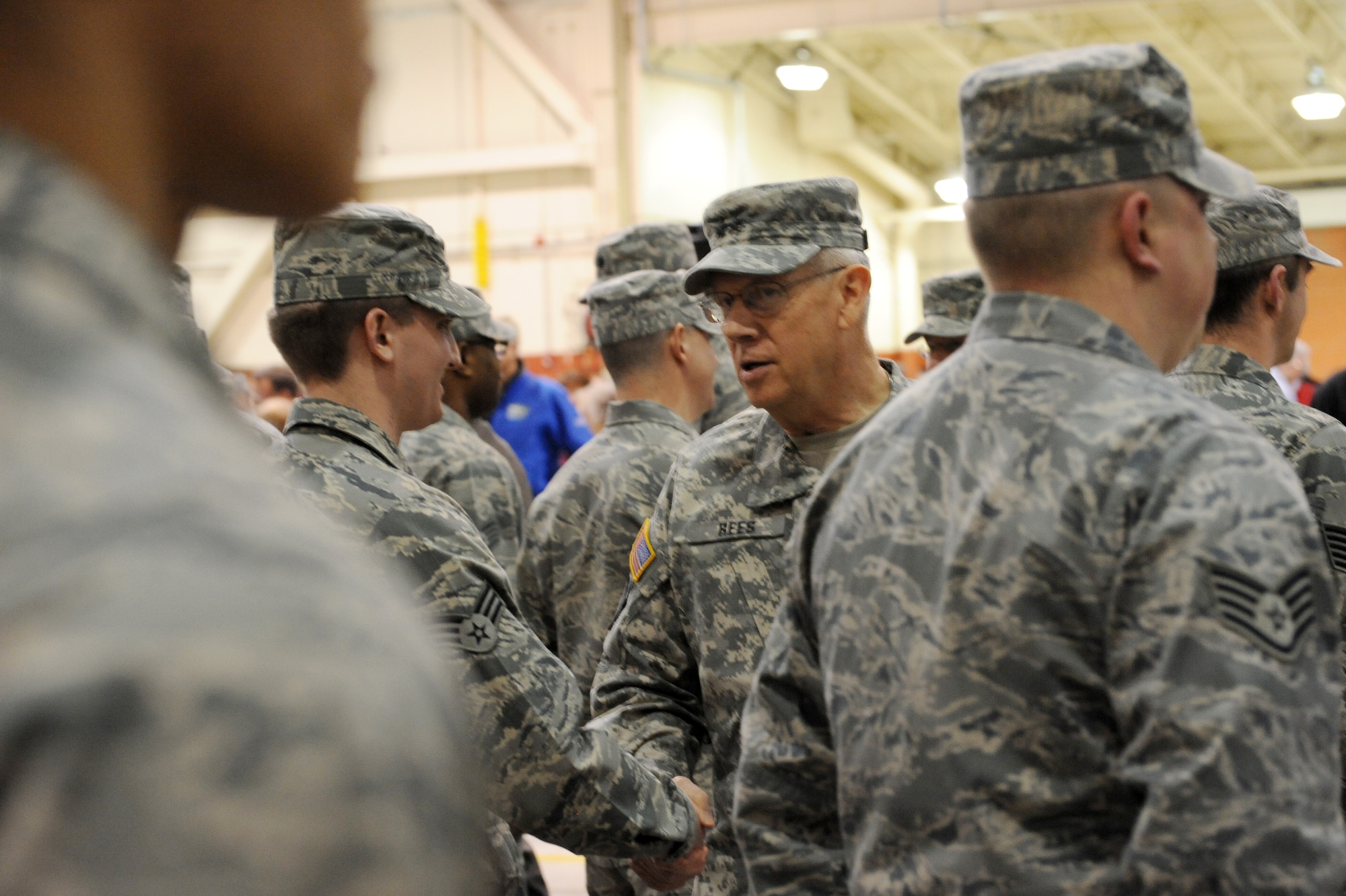 Oregon Major General Raymond F. Rees, Adjutant General, Oregon, meets the Airmen departing for the Middle East after the mobilization ceremony for the 116th Air Control Squadron, held at the Portland Air Guard Base in Portland, Ore., Mar. 4.  Kitzhaber, Maj. Gen. Raymond F. Rees, Adjutant General, Oregon; Brig. Gen. Steven Gregg, Oregon Air National Guard Commander; Congressman David Wu (OR-District 1), and other dignitaries, along with hundreds of family, friends, fellow Airmen and Soldiers attended the event.  The unit's Airmen will deploy to the Middle East in support of Air Forces Central (CENTAF), where they will perform Air Battle Management missions for four months.  (U.S. Air Force photograph by Tech. Sgt. John Hughel, 142nd Fighter Wing Public Affairs)