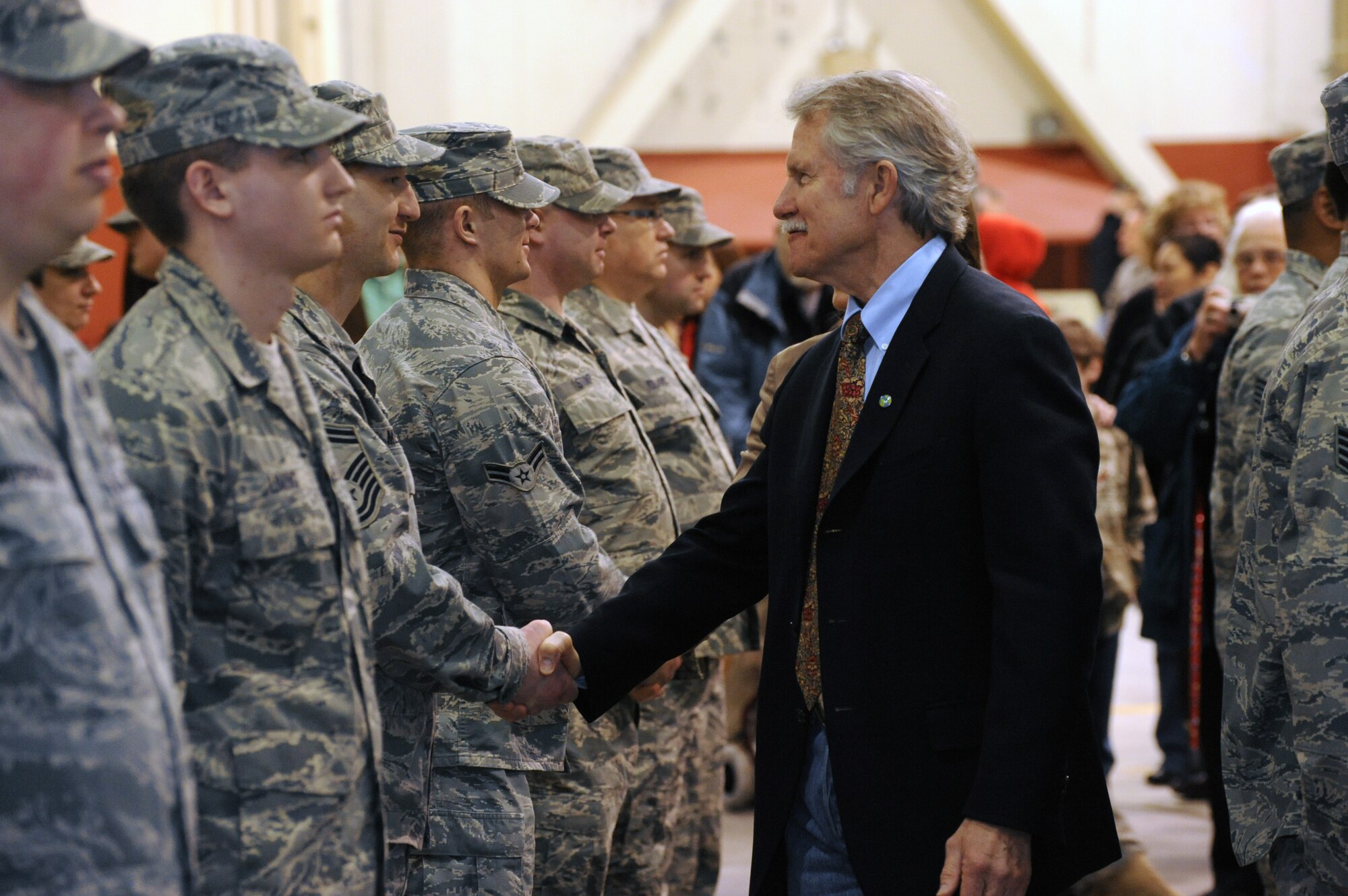 Oregon Governor John Kitzhaber meets with more than 80 Airmen of the Oregon Air National Guard's 116th Air Control Squadron, following the unit's mobilization ceremony at the Portland Air Guard Base in Portland, Ore., Mar. 4.  Kitzhaber, Maj. Gen. Raymond F. Rees, Adjutant General, Oregon; Brig. Gen. Steven Gregg, Oregon Air National Guard Commander; Congressman David Wu (OR-District 1), and other dignitaries, along with hundreds of family, friends, fellow Airmen and Soldiers attended the event.  The unit's Airmen will deploy to the Middle East in support of Air Forces Central (CENTAF), where they will perform Air Battle Management missions for four months.  (U.S. Air Force photograph by Tech. Sgt. John Hughel, 142nd Fighter Wing Public Affairs)

