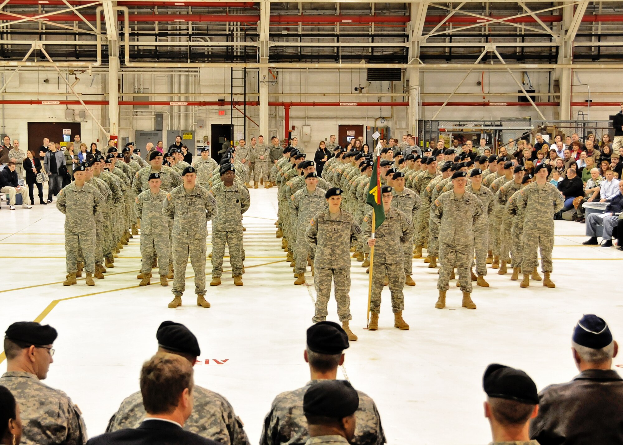 Members the 105th Military Police Company National Guard unit say goodbye to friends and family, March 9, 2011, Niagara Falls Air Reserve Station, NY. The members of the 105 are leaving for a second time to an undisclosed location in south west Asia. (U.S. Air Force photo by Staff Sgt. Joseph McKee)