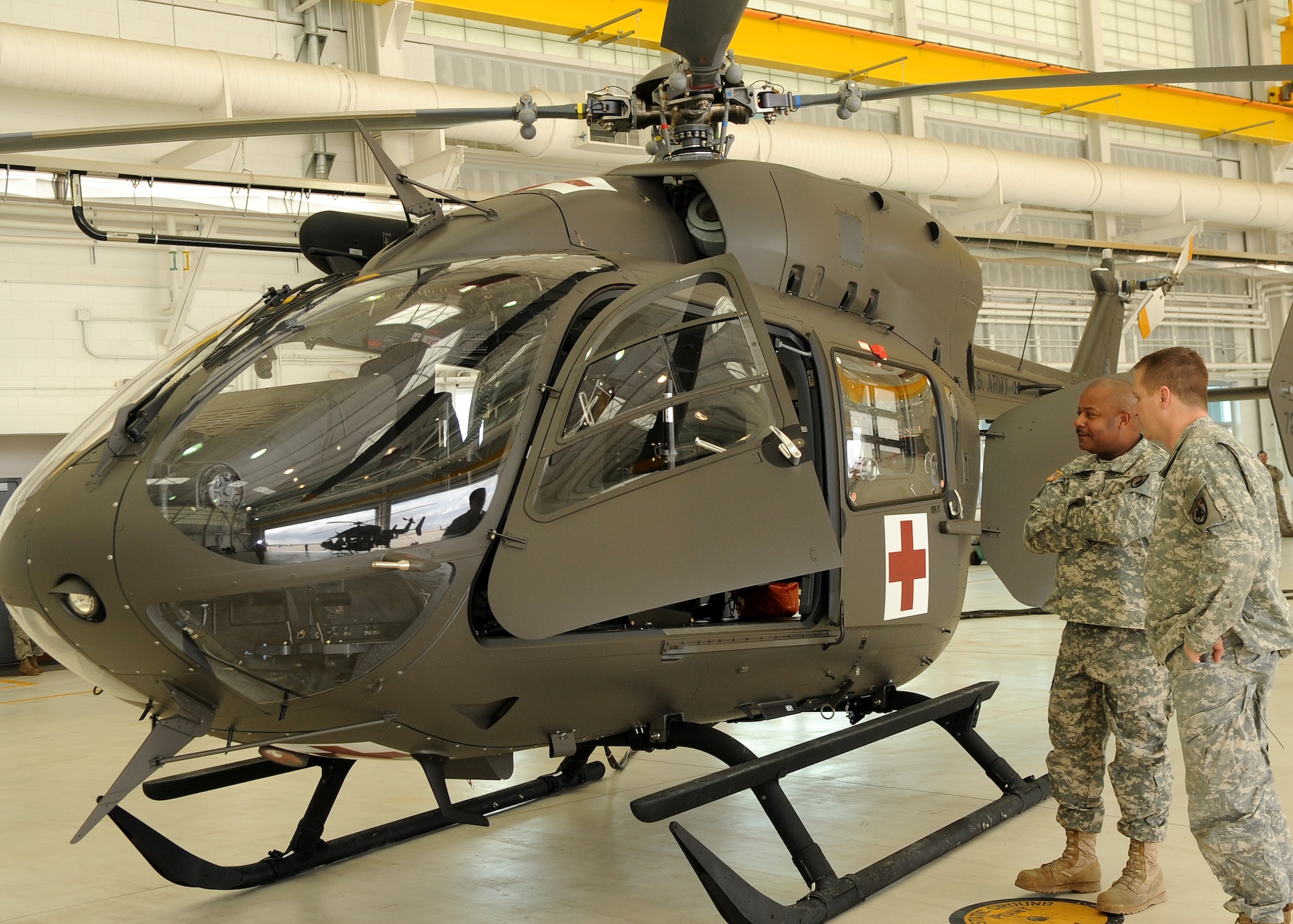 BUCKLEY AIR FORCE BASE, Colo. -- U.S. Army Soldiers takes a look at the new LUH-72 Lakota Helicopter March 3, 2011. The U.S. Army has been replacing the aging, UH-1 Iroquois and OH-58 fleet with the new Lakota.(U.S. Air Force photo by Airman 1st Class Marcy Glass.)

