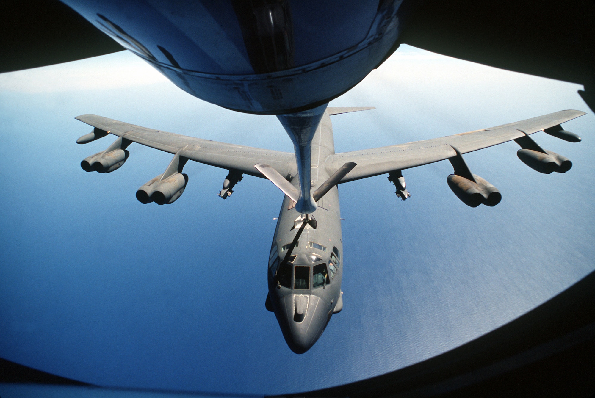 A boom operator for a KC-135 Stratotanker refuels a B-52 Stratofortress during air operations for Operation Desert Storm in February 1991. (Department of Defense Photo)

