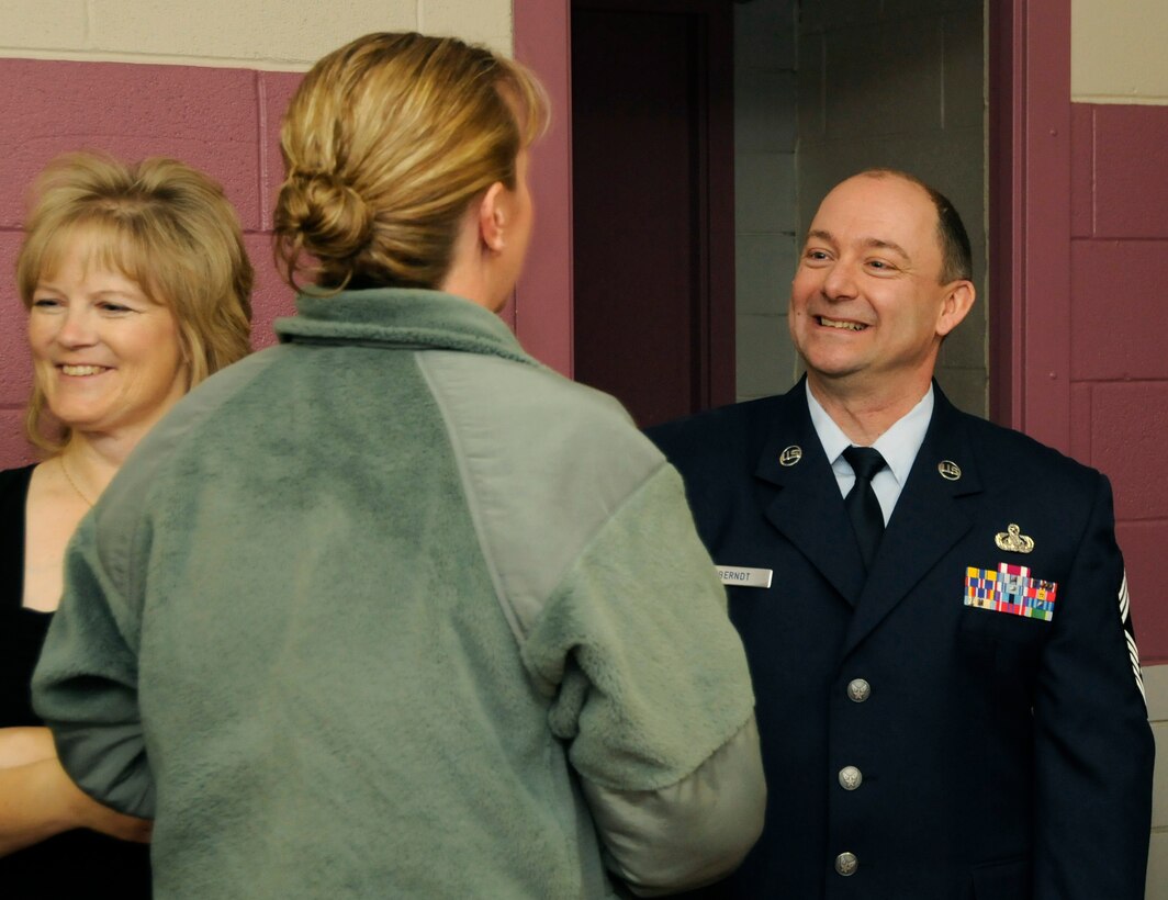 Chief Master Sgt. Todd Berndt, 173rd Communications Squadron, is congratulated by members of the 173rd Fighter Wing during a promotion ceremony, Feb. 5, 2011, at Kingsley Field in Klamath Falls, Ore.  