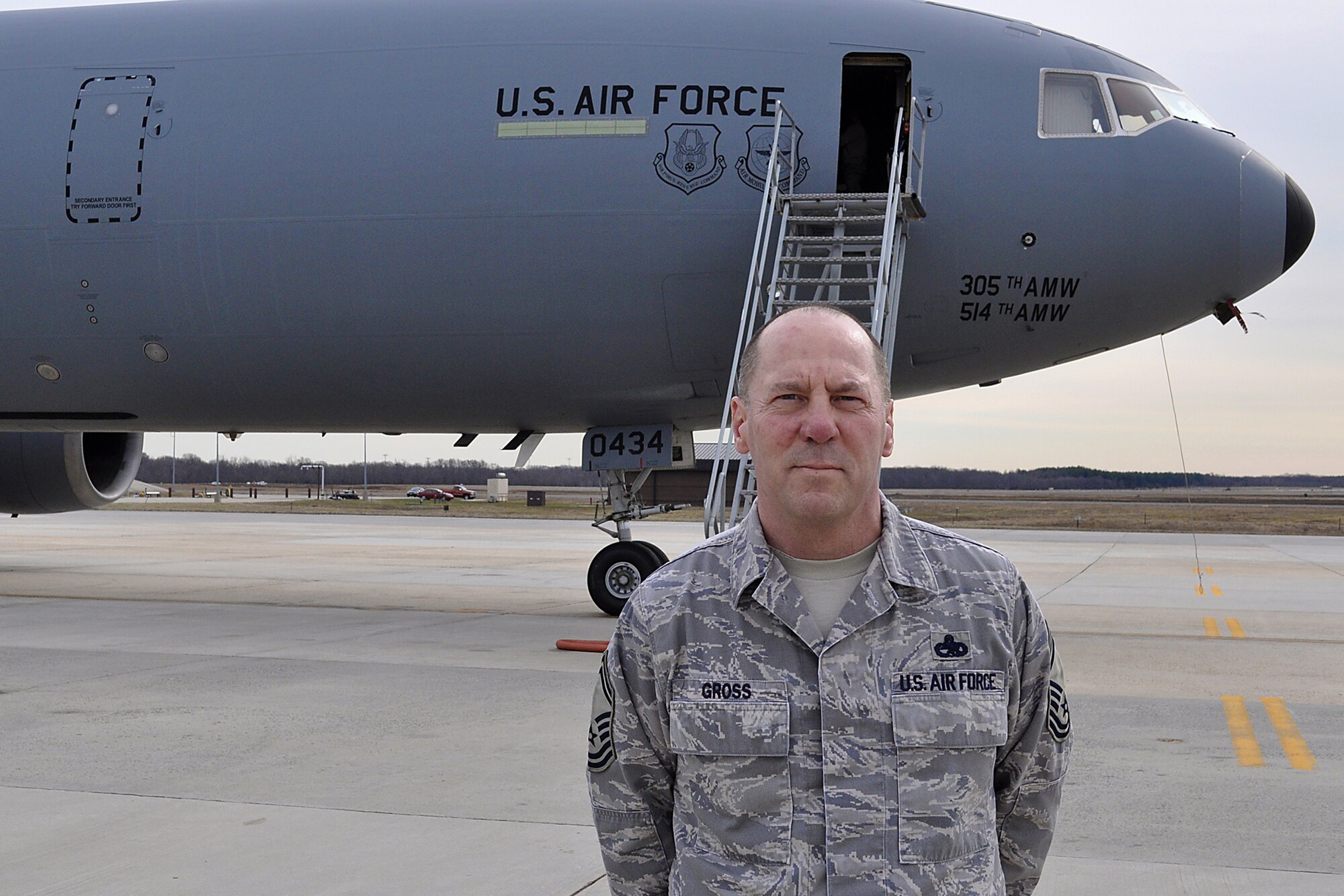 Senior Master Sgt. Bill Gross stands on the flightline March 8, 2011at Joint Base Mcguire-Dix-Lakehurst, N.J. Sergeant Gross was a long-time crew chief assigned to the Air Force's first KC-10 and has been stationed with the aircraft for nearly his entire career. As the KC-10 celebrates its 30th year of Air Force service on March 17, 2011, Sergeant Gross can claim that he has been there every step of the way. (U.S. Air Force photo)