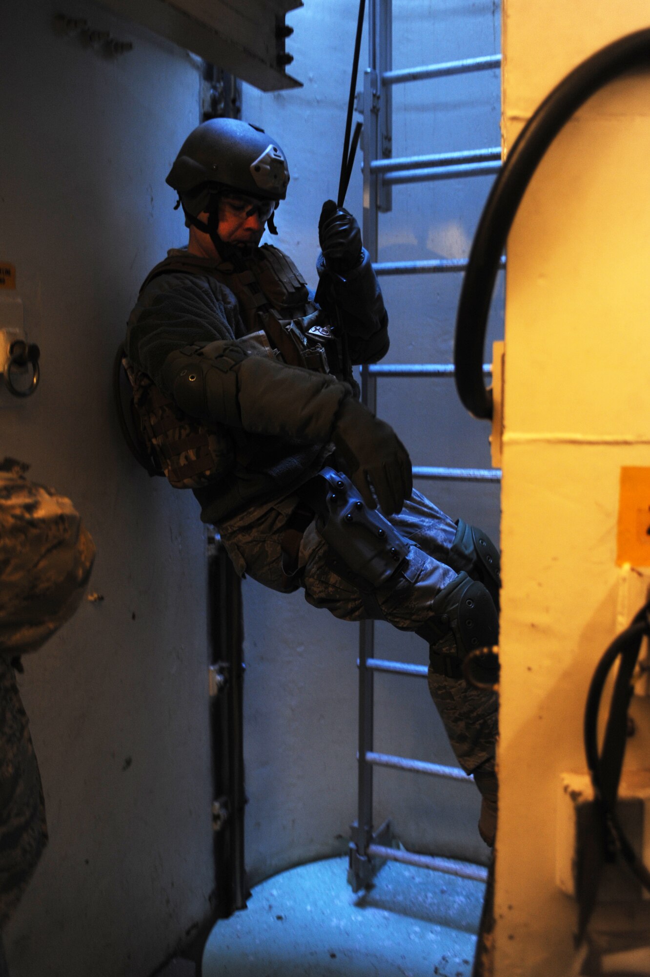 MINOT AIR FORCE BASE, N.D. – Senior Airman Christopher Crean, 791st Missile Security Forces Squadron Tactical Response Force member, repels down Uniform-1, a training facility here, for Tactical Response Force training here March 4. Everyone part of the TRF must undergo a series of training designed to push them beyond their physical limits and to evaluate how well they work under a great deal of pressure. (U.S. Air Force photo by Airman 1st Class Aaron-Forrest Wainwright)