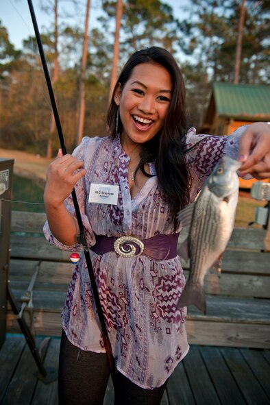 Senior Airman Armelyn Braceros, 4th Fighter Wing Airman of the Year from Seymour Johnson Air Force Base, N.C., shows off a fish she caught March 8 in Barney, Ga. Airman Braceros drove from North Carolina to attend the 2010 9th Air Force Outstanding Performers of the Year event and said she’s been enjoying her visit to Moody Air Force Base and Valdosta, Ga. (U.S. Air Force photo/Staff Sgt. Jamal D. Sutter)(RELEASED)