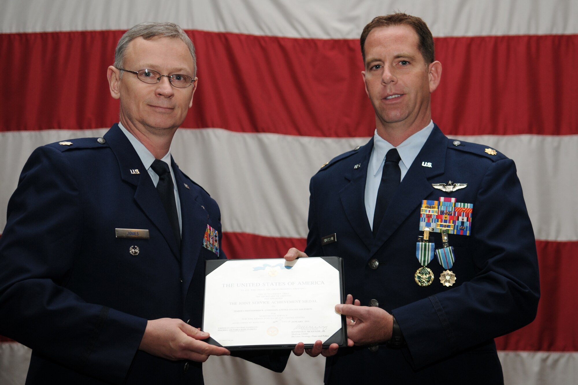 Colonel (S) Joseph Jones, vice commander, 307th Bomb Wing, poses with Maj. Christopher Anderson, flight commander, 93rd Bomb Squadron, during the first ever “Barksdale Reserve Awards Ceremony” at Hoban Hall on Barksdale Air Force Base, La., March 6, 2011. Major Anderson was awarded the Joint Service Commendation Medal and the Joint Service Achievement Medal for meritorious service for the Armed Forces of the United States. The awards ceremony was the first to be held since the deactivation of the 917th Wing, and reactivation of the 307th Bomb Wing. It brings together all of the Reserve components at Barksdale AFB to recognize the accomplishments of their Airmen. (U.S. Air Force photo/Master Sgt. Greg Steele)