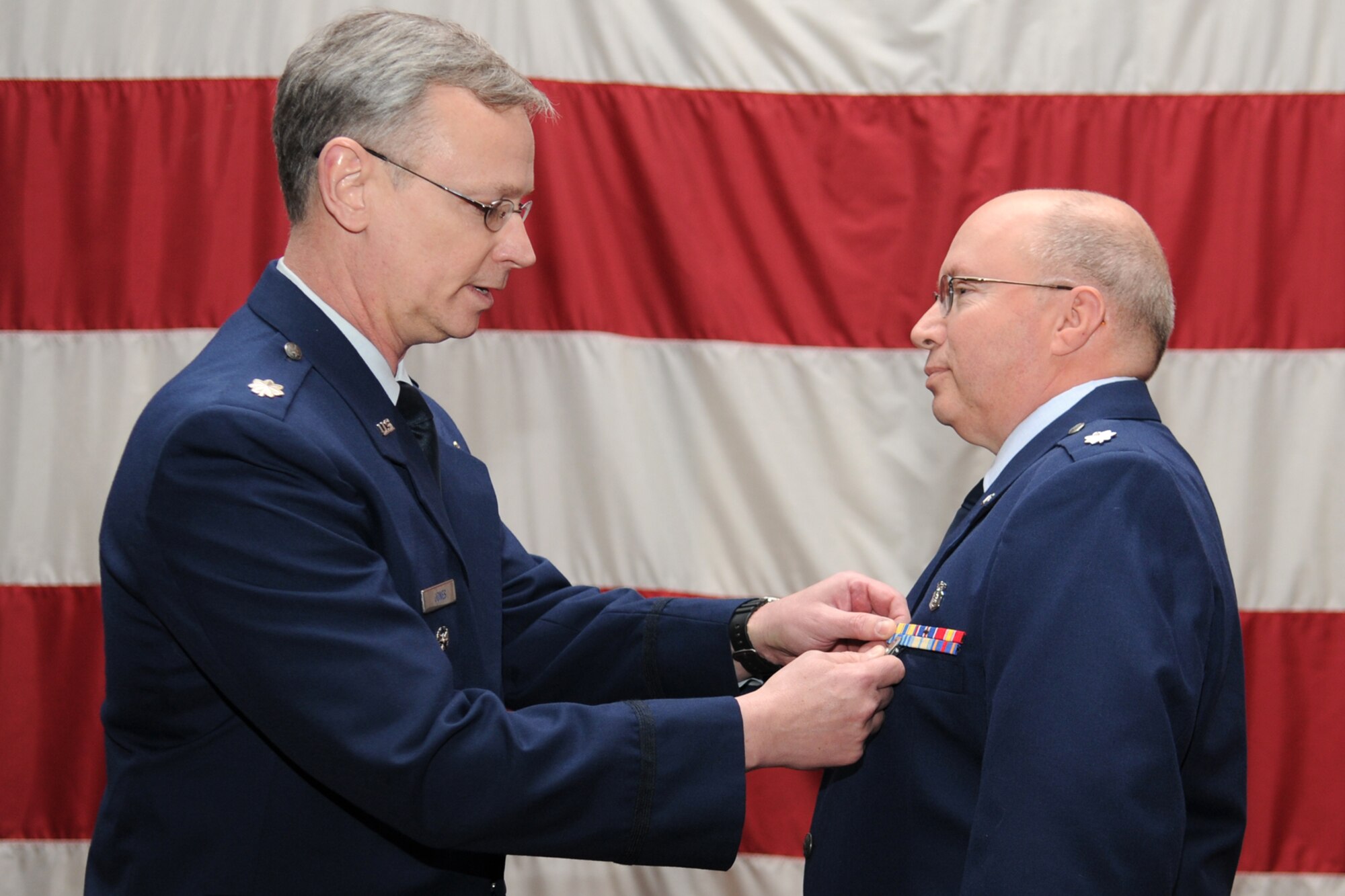 Colonel (S) Joseph Jones, vice commander, 307th Bomb Wing, pins the Meritorious Service Medal on Lt. Col. Gary J. Avallone, optometrist, 307th Medical Squadron, during the first ever “Barksdale Reserve Awards Ceremony” at Hoban Hall on Barksdale Air Force Base, La., March 6, 2011. Colonel Avallone received the medal for outstanding service to 917th Medical Squadron from Jan. 1, 2005 to Dec. 31 2009. The ceremony was the first to be held since the deactivation of the 917th Wing, and brings together all of the Reserve components at Barksdale AFB to recognize the accomplishments of their Airmen. (U.S. Air Force photo/Master Sgt. Greg Steele) 