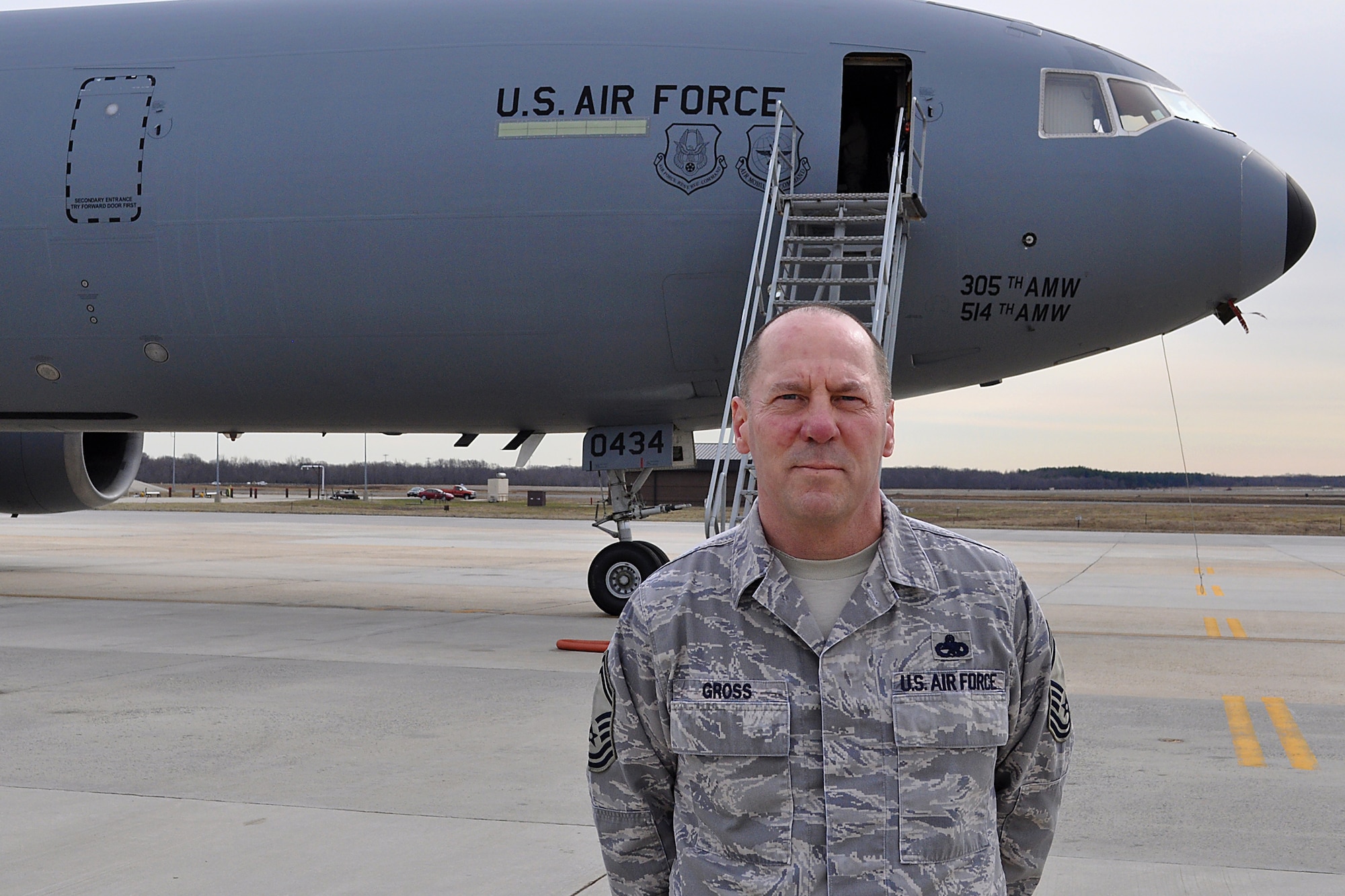 JOINT BASE MCGUIRE-DIX-LAKEHURST, N.J. --Technical Sgt. Bill Gross, a KC-10 Extender crew chief, stands on the flightline here March 8, 2011. Sergeant Gross was the long-time crew chief assigned to the Air Force's first KC-10 and has been stationed with the aircraft for nearly his entire career. As the KC-10 celebrates its 30th year of Air Force service on March 17, 2011, Sergeant Gross can claim that he has been there every step of the way. (U.S. Air Force photo)
