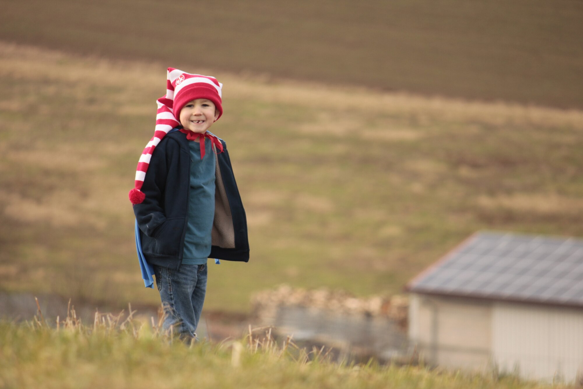 5-year-old Easton Palmer plays in a field near his house. At 3, he was diagnosed with mild Asperger’s Syndrome with hyposensitivity and sensory seeking. (Courtesy Photo)