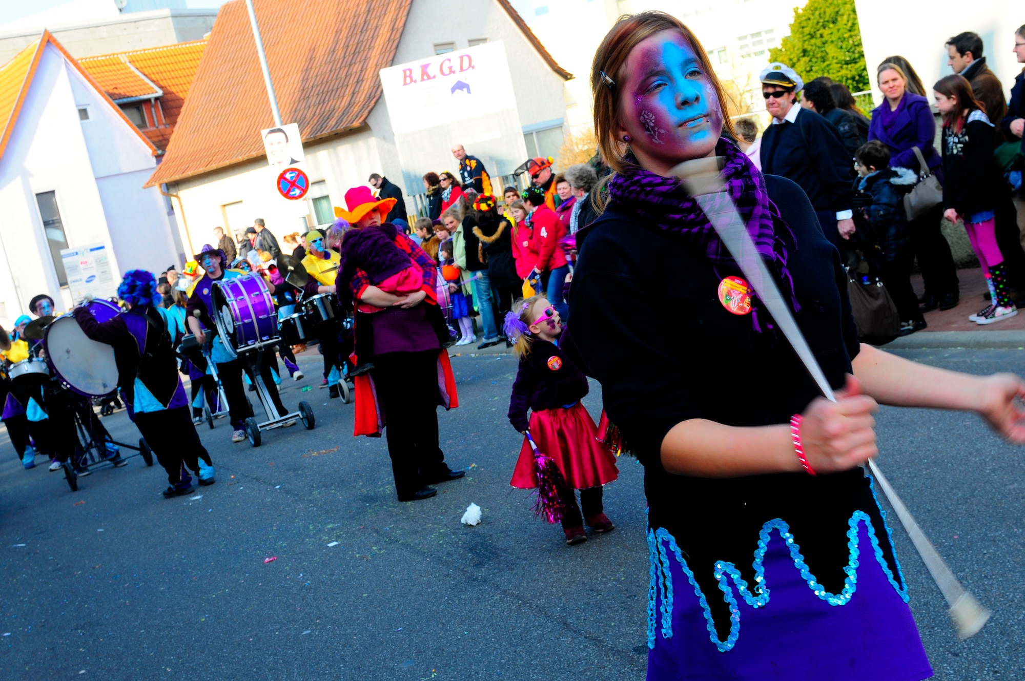 Parade participants entertain during the annual Fasching parade in Ramstein village, Germany, March 8, 2011. This annual event is a pre-Lenten carnival which is celebrated with the donning of wild and fancy costumes to chase away the evil spirits of winter in preparation for spring. (U.S. Air Force photo by Airman 1st Class Brea Miller)