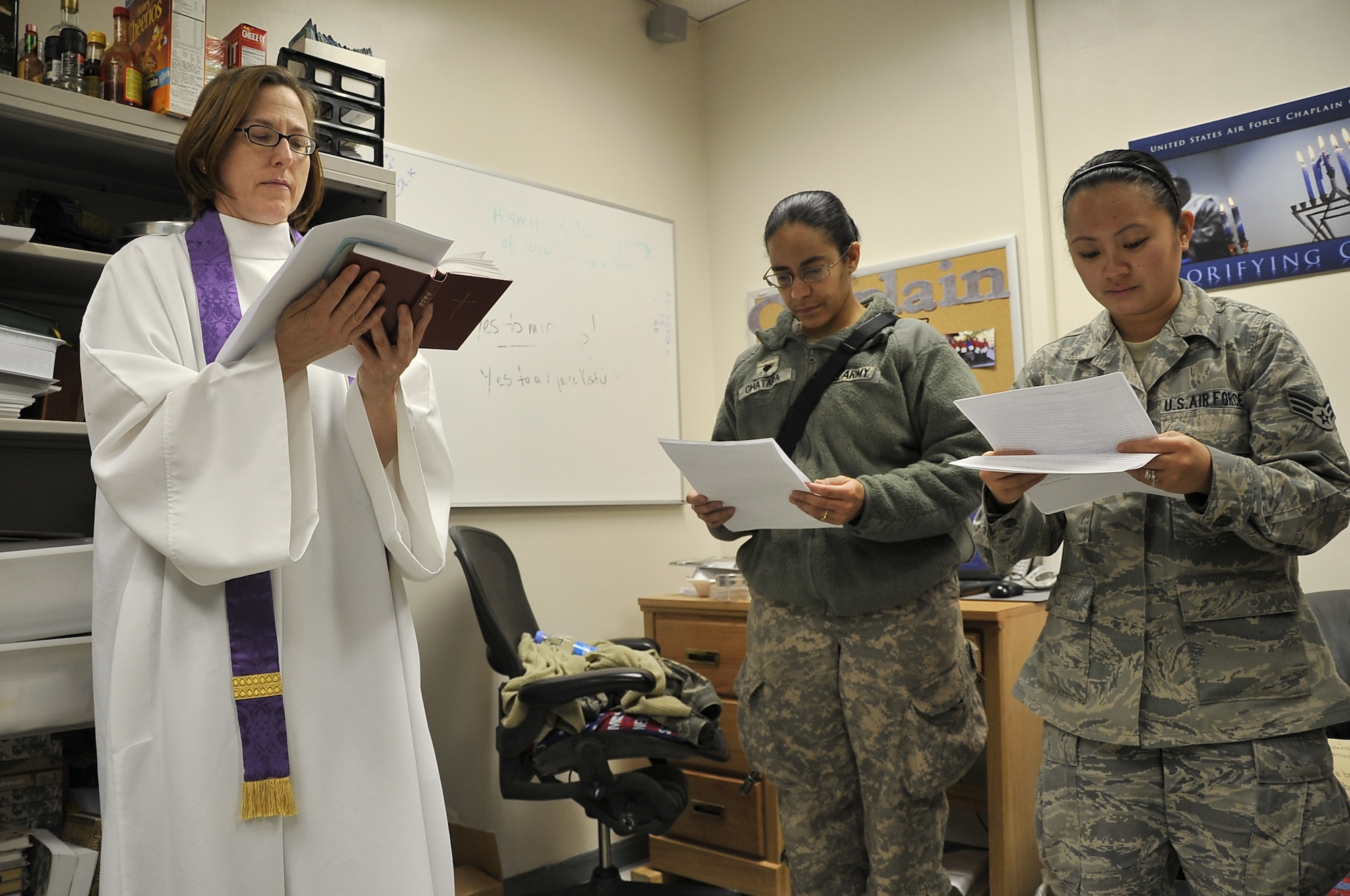 Chaplain Sarah Shirley leads a small Ash Wednesday service, 9 March 2011, at
Craig Joint Theater Hospital, Bagram Airfield, Afghanistan. Assigned to the 455th Air Expeditionary Wing, Chaplain Shirley provides spiritual guidance at the CJTH. (U.S. Air Force photo by Staff Sgt. Larry Moore)